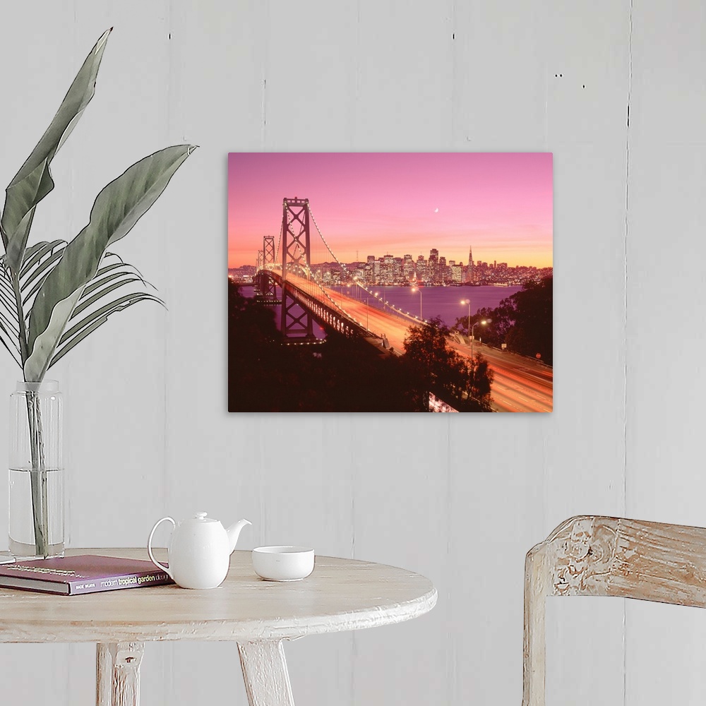 A farmhouse room featuring Big photograph displays a large overpass near the coast of the Western United States brightly shi...