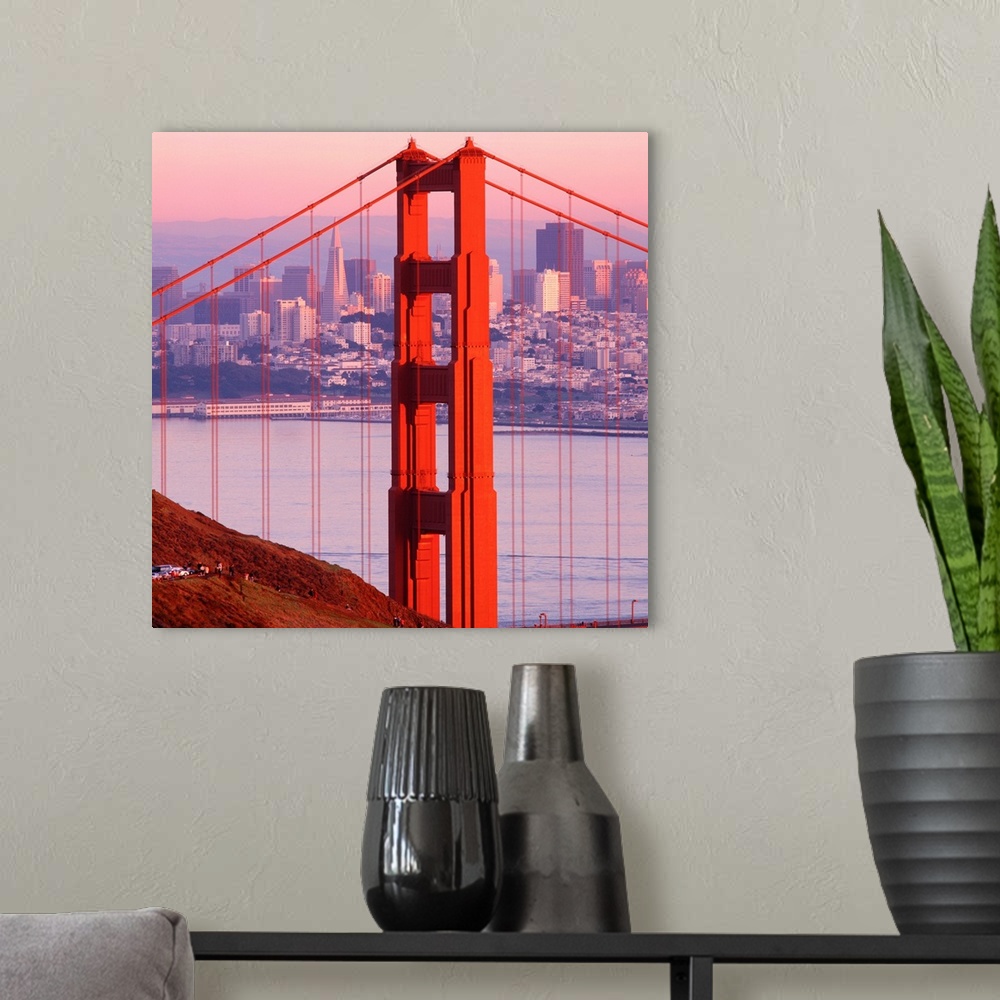 A modern room featuring Up-close photograph of iconic overpass detail with city skyline in background at dusk.