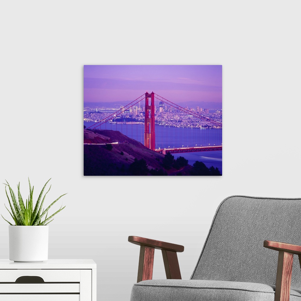 A modern room featuring Giant photograph focuses on one of the supports for a famous overpass that spans a large bay with...