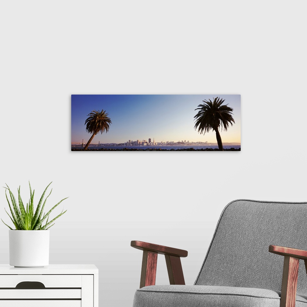 A modern room featuring California, San Francisco, Palm trees at dusk