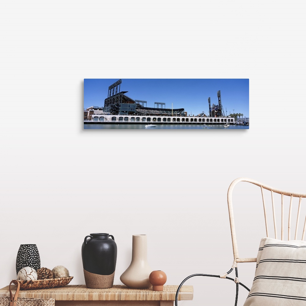 A farmhouse room featuring The San Francisco Giants baseball stadium is photographed from the waterfront view.