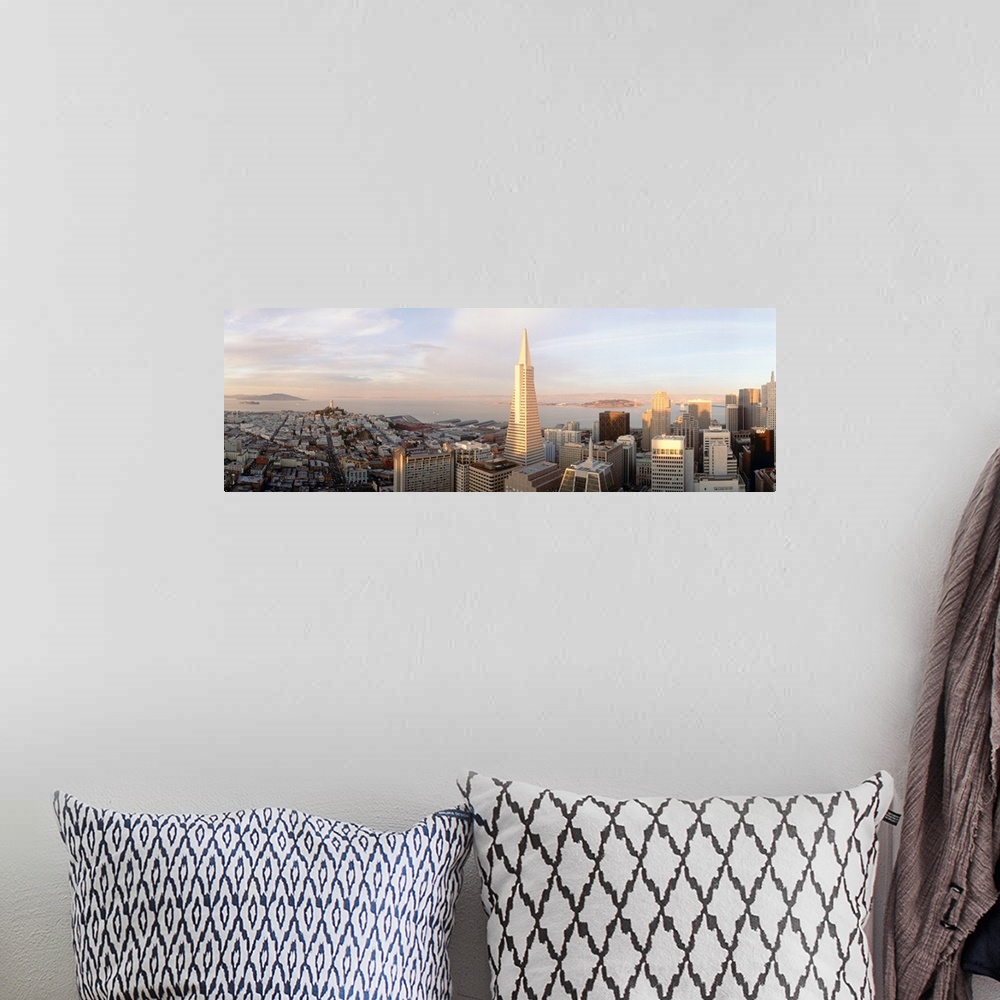 A bohemian room featuring Aerial photograph on a big canvas of the San Francisco skyline, including the Transamerica buildi...