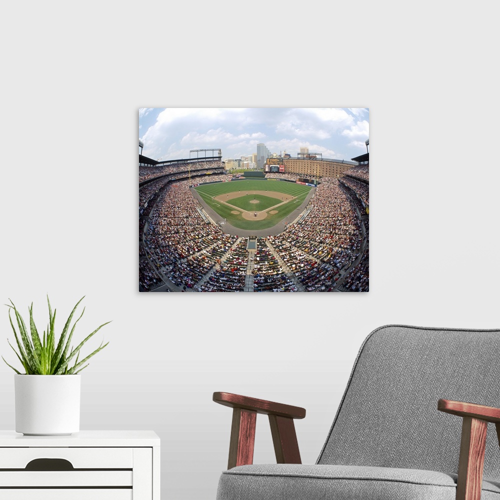 A modern room featuring Big canvas print of a packed baseball stadium with a game going on in Maryland.