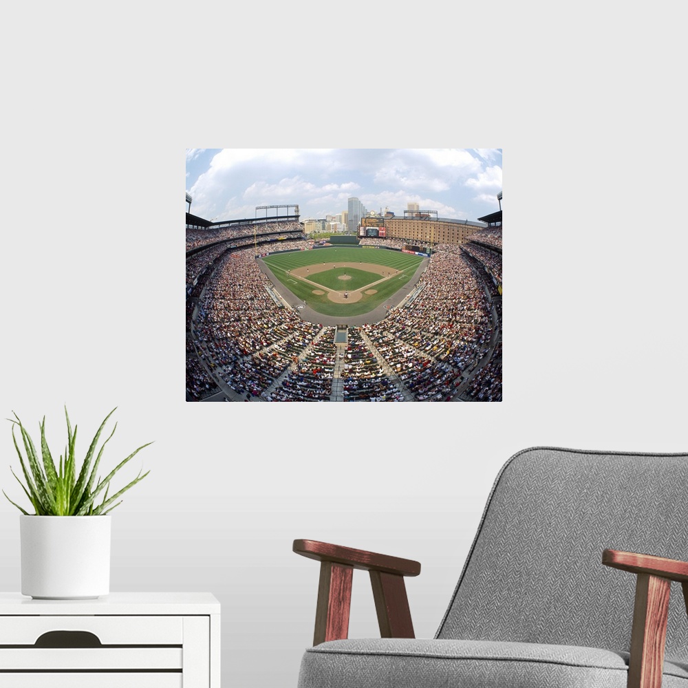 A modern room featuring Big canvas print of a packed baseball stadium with a game going on in Maryland.
