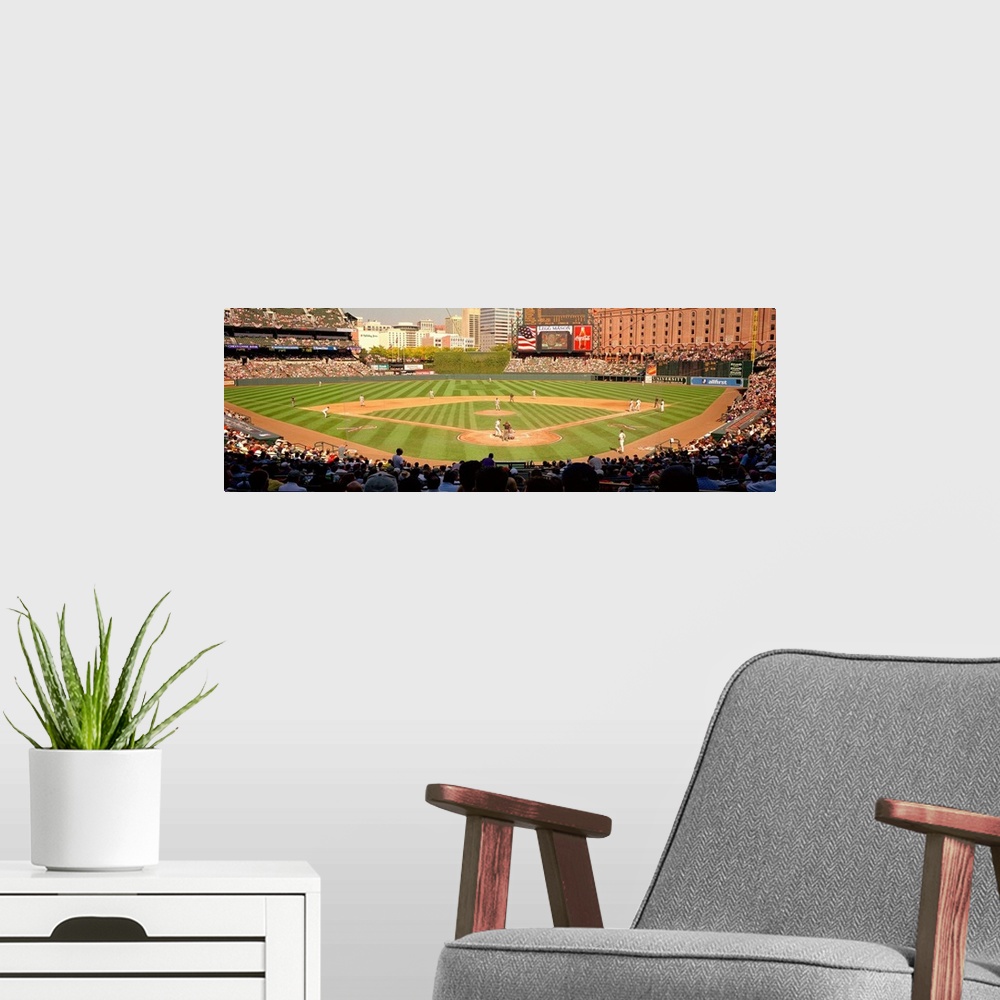 A modern room featuring Panoramic photograph taken of the stadium that is home to the Orioles of Major League Baseball as...