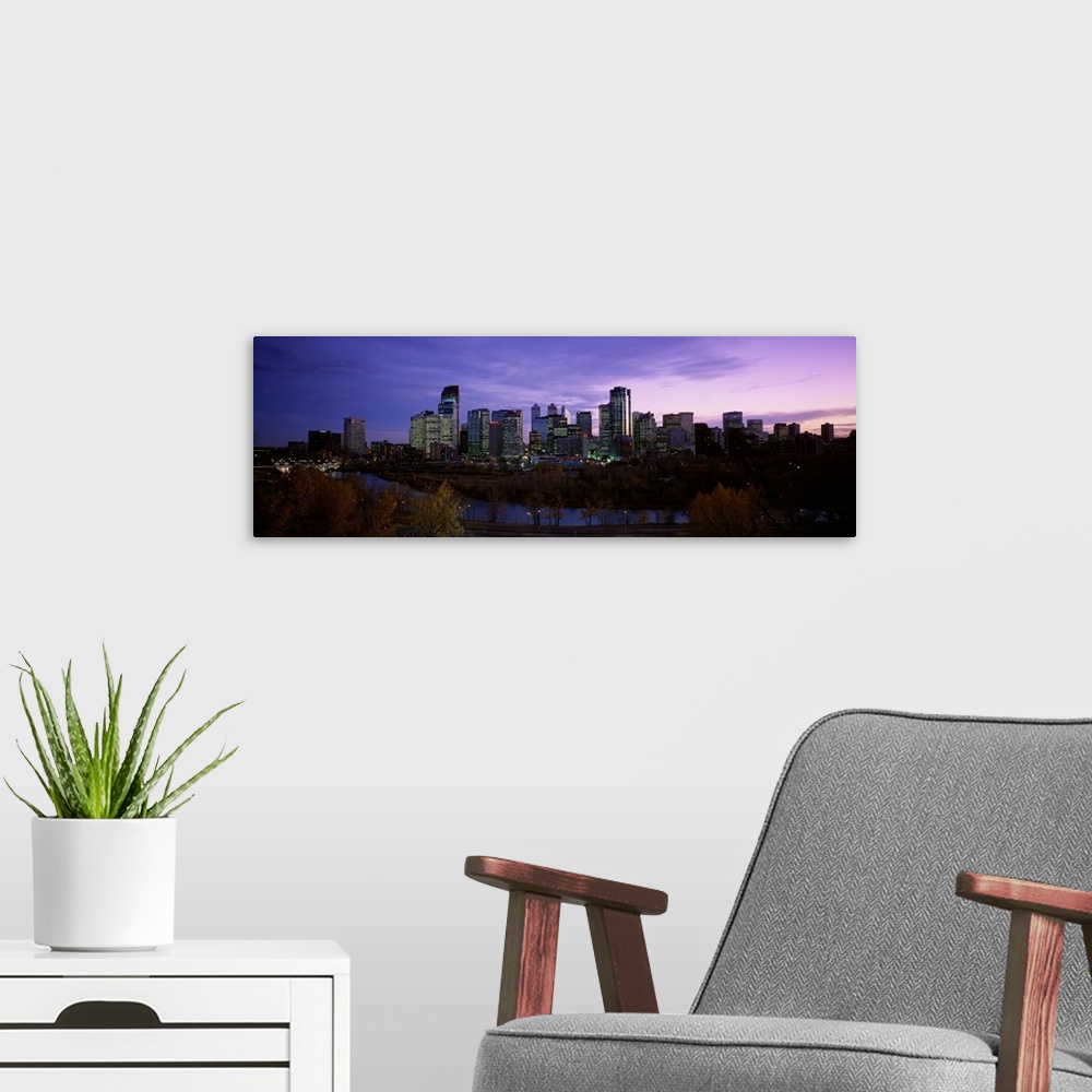 A modern room featuring Canada, Alberta, Calgary, Crescent Drive, City at dusk from Crescent Drive