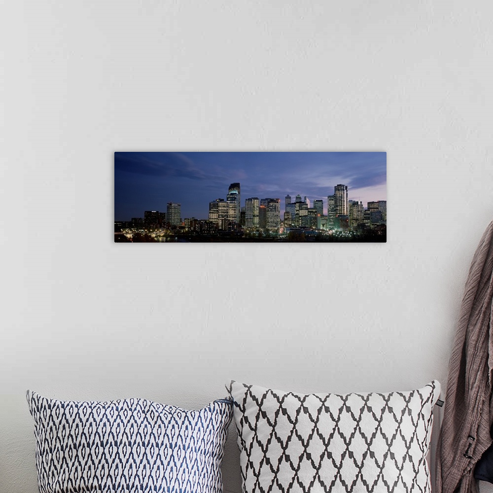 A bohemian room featuring Canada, Alberta, Calgary, Crescent Drive, Skyscrapers in a city at sunset