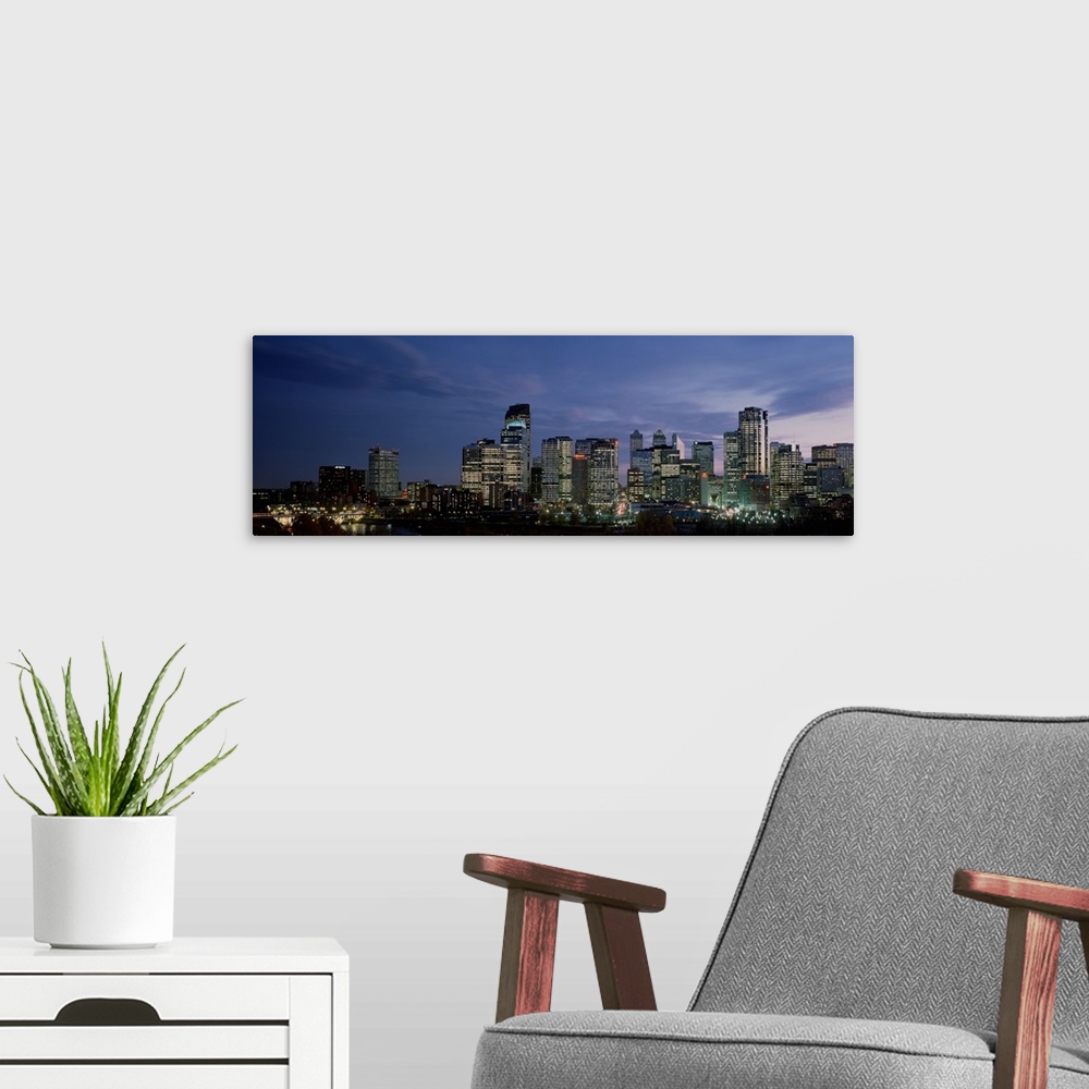 A modern room featuring Canada, Alberta, Calgary, Crescent Drive, Skyscrapers in a city at sunset