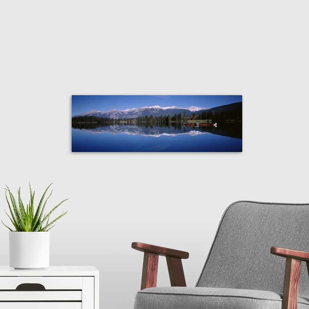 A modern room featuring Canada, Alberta, Jasper National Park, Lake Beauvert, Boat in a lake