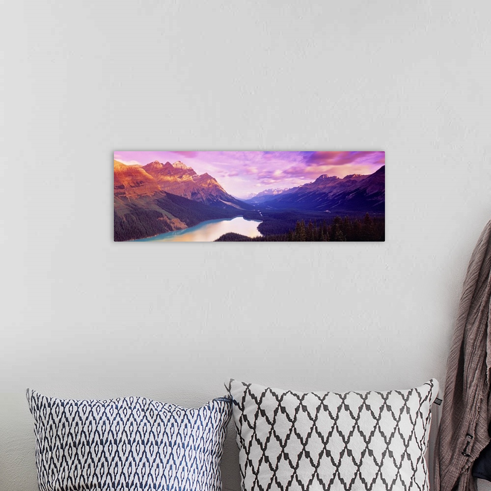 A bohemian room featuring A colorful sunrise over the mountains of Peyto Lake in Alberta, Canada.