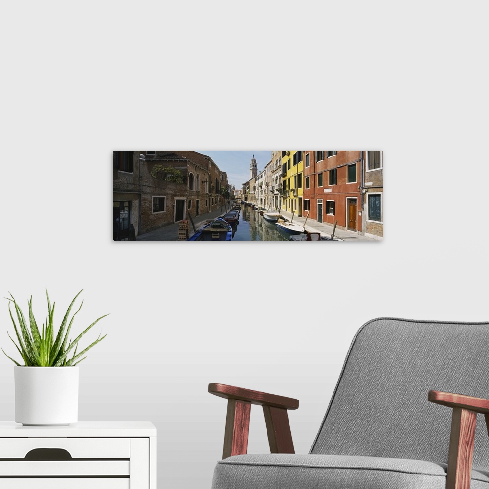 A modern room featuring Canal passing through a city, Venice, Italy
