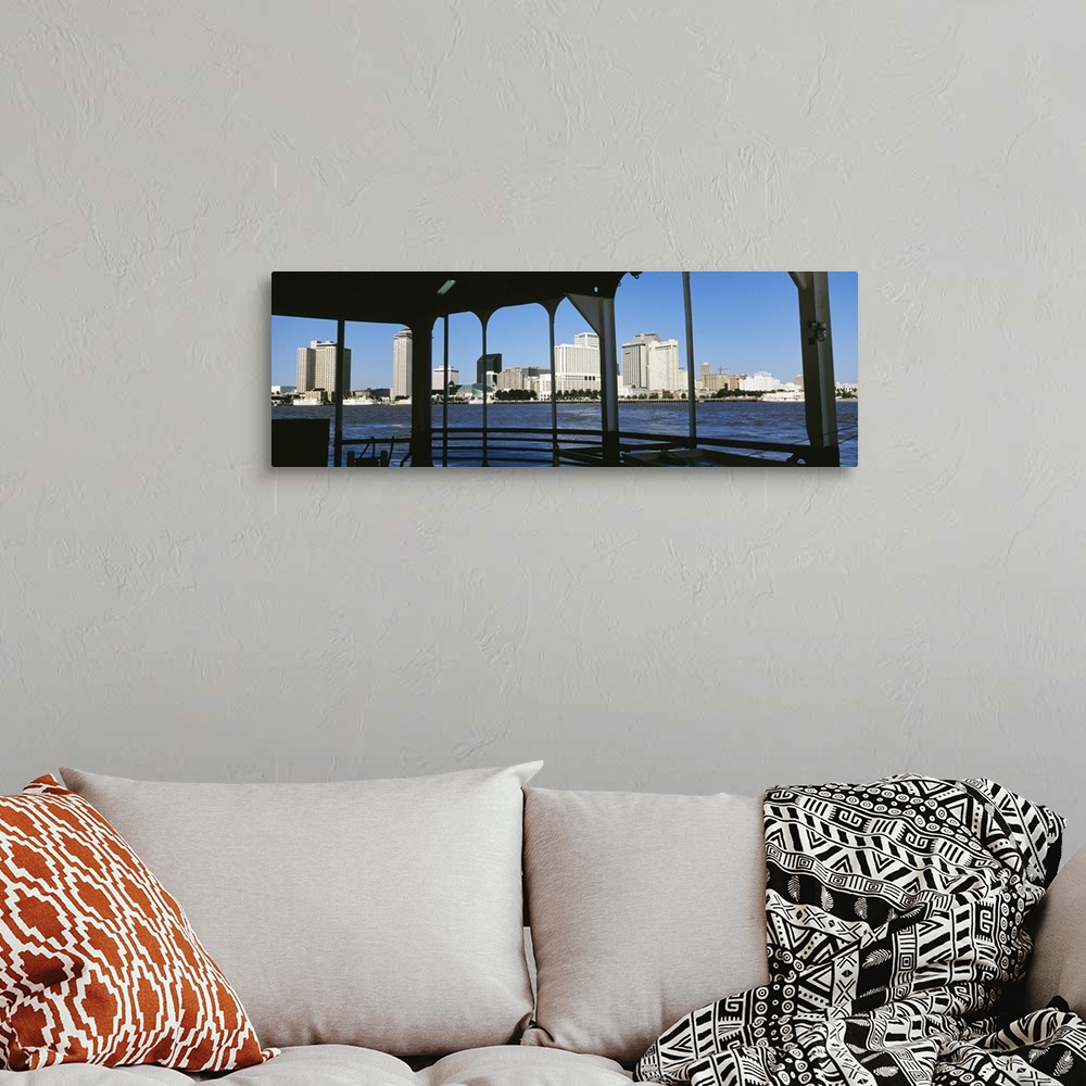 A bohemian room featuring Canal Street Ferry Skyline New Orleans LA