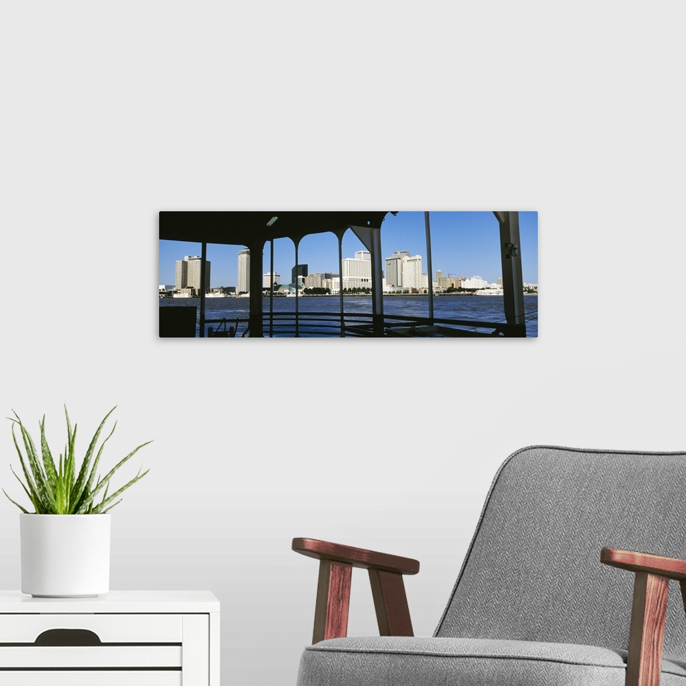 A modern room featuring Canal Street Ferry Skyline New Orleans LA