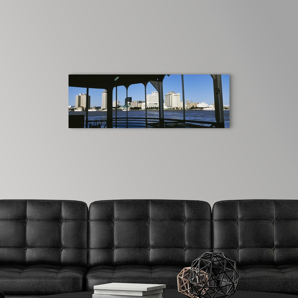 A modern room featuring Canal Street Ferry Skyline New Orleans LA