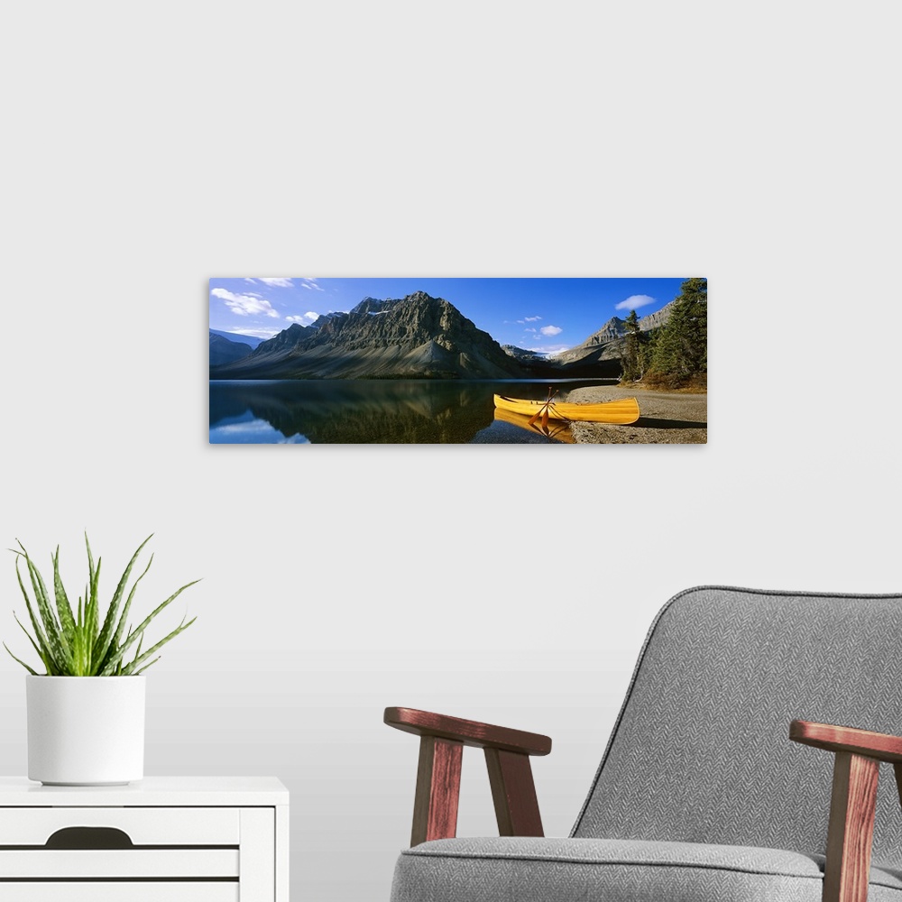 A modern room featuring Canoe at the lakeside, Bow Lake, Banff National Park, Alberta, Canada