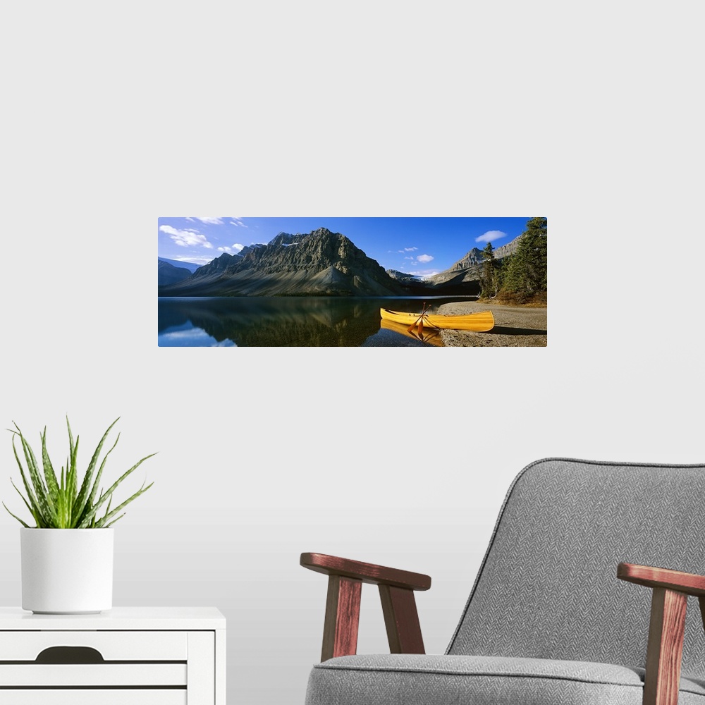 A modern room featuring Canoe at the lakeside, Bow Lake, Banff National Park, Alberta, Canada