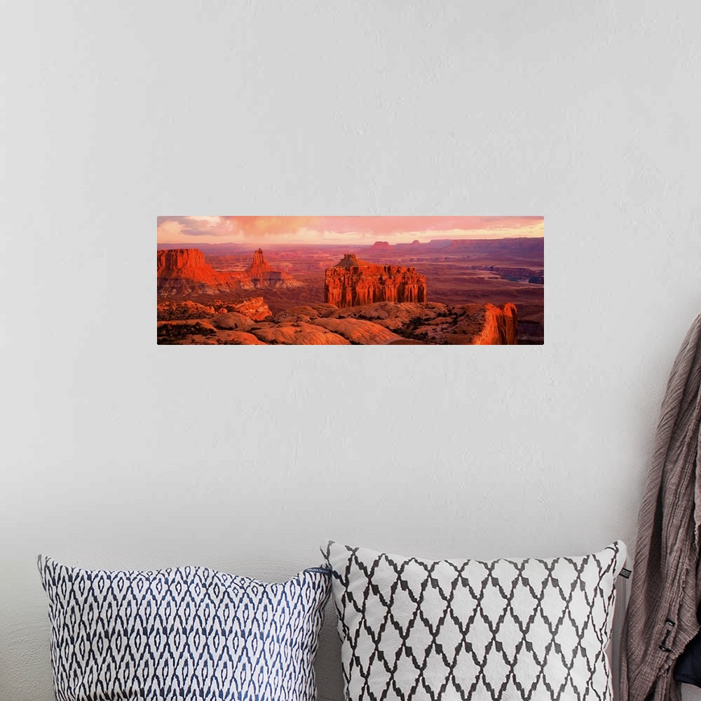 A bohemian room featuring Giant panoramic photo of the Canyonlands National Park in Utah (UT) with peaks and valleys as far...