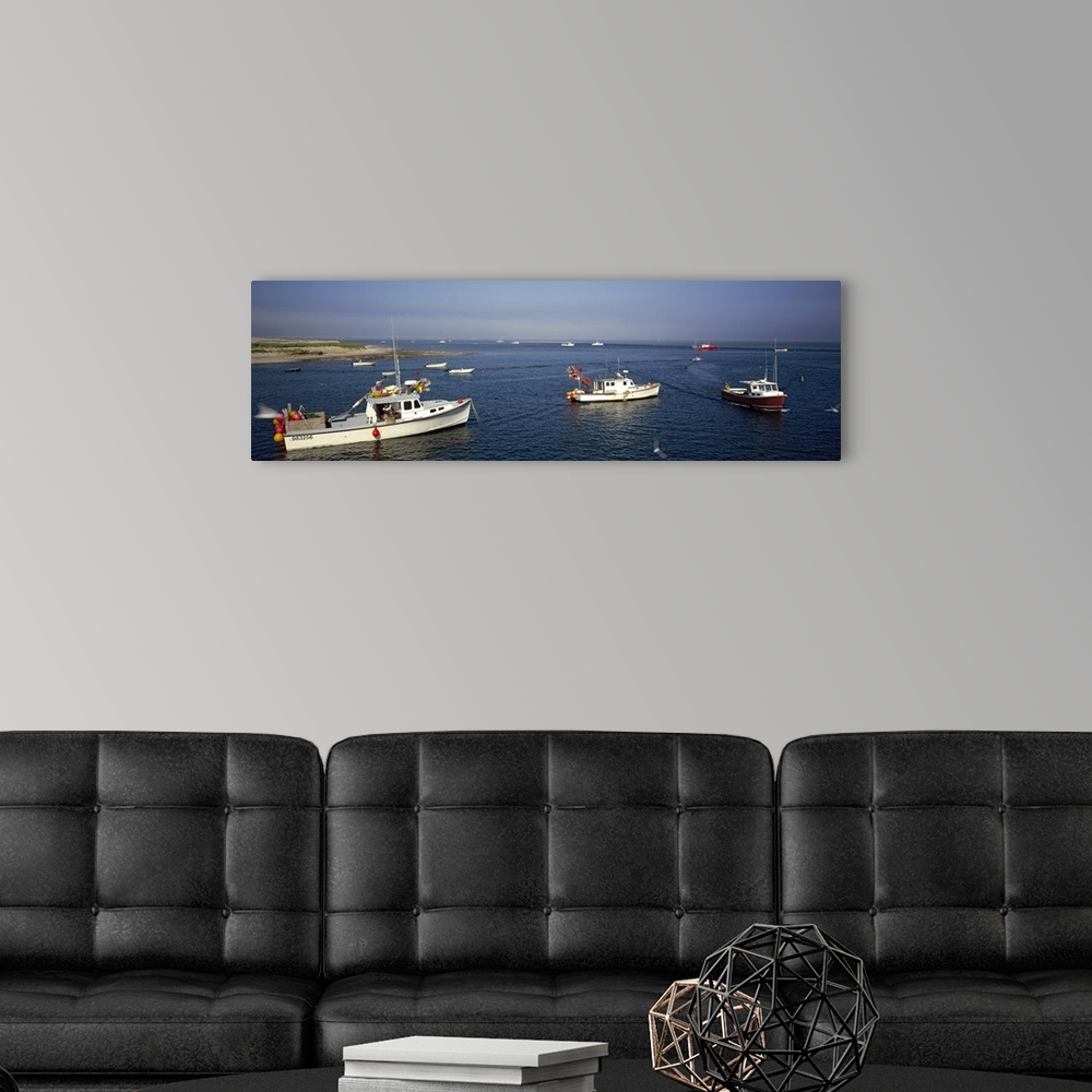 A modern room featuring Long and horizontal photo print of boats coming out of a harbor in Massachusetts.