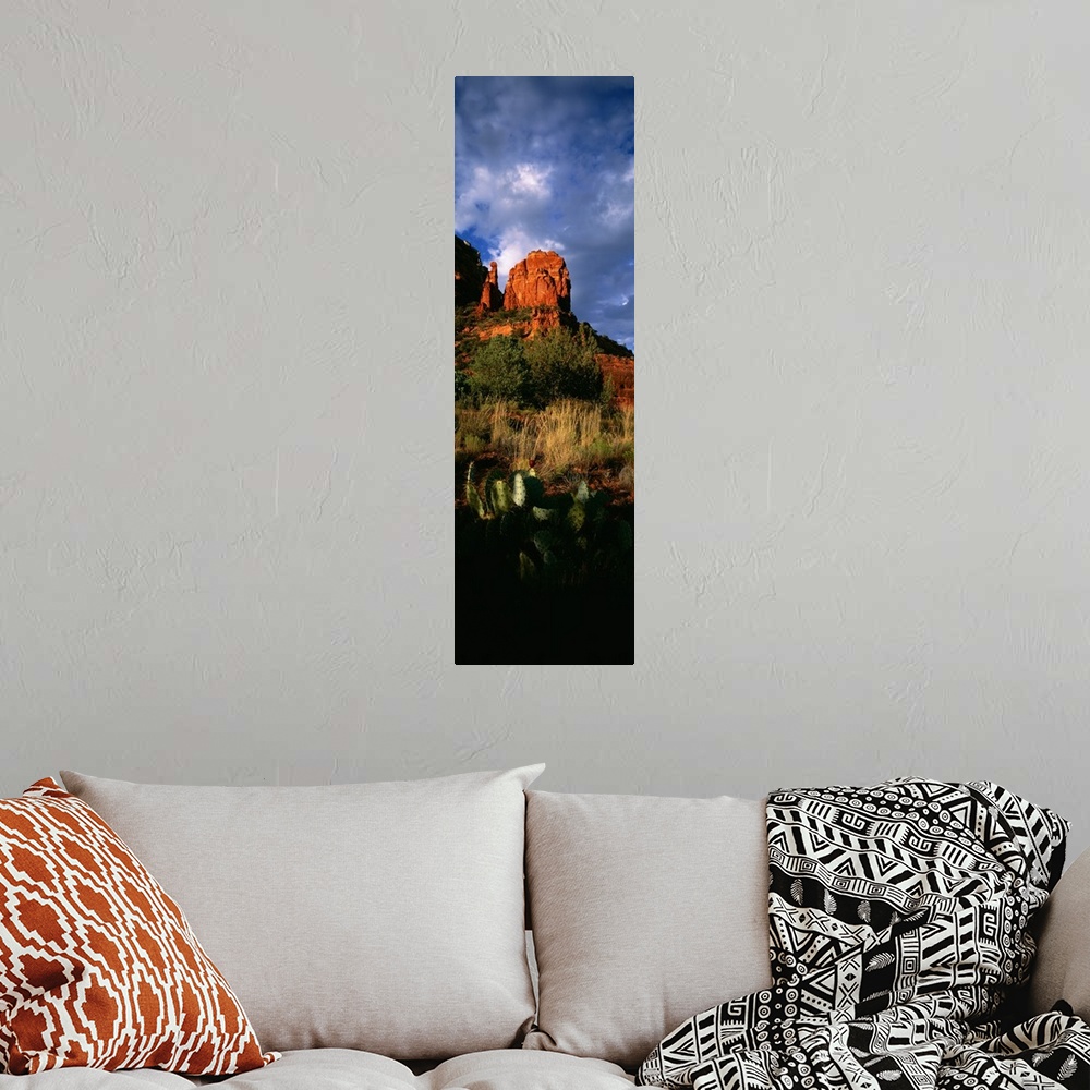 A bohemian room featuring A vertical panoramic of Thunder Mountain, one of the highest summits in Sedona Arizona on a cloud...