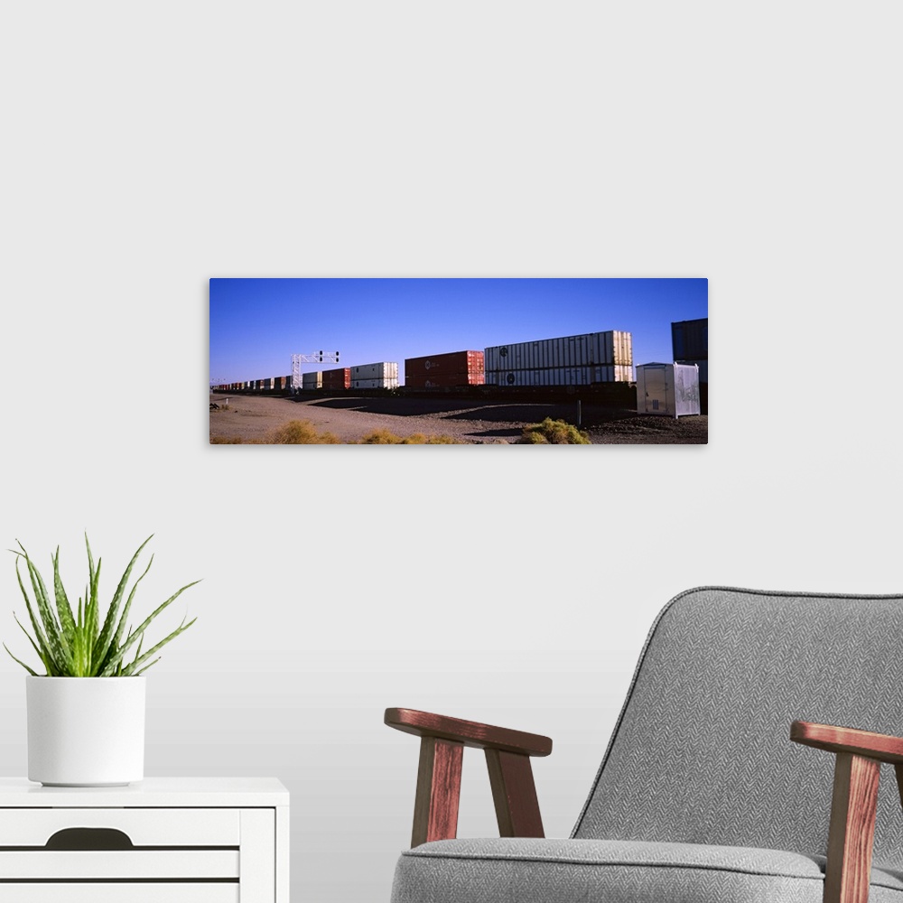 A modern room featuring Cargo containers on a freight train, California