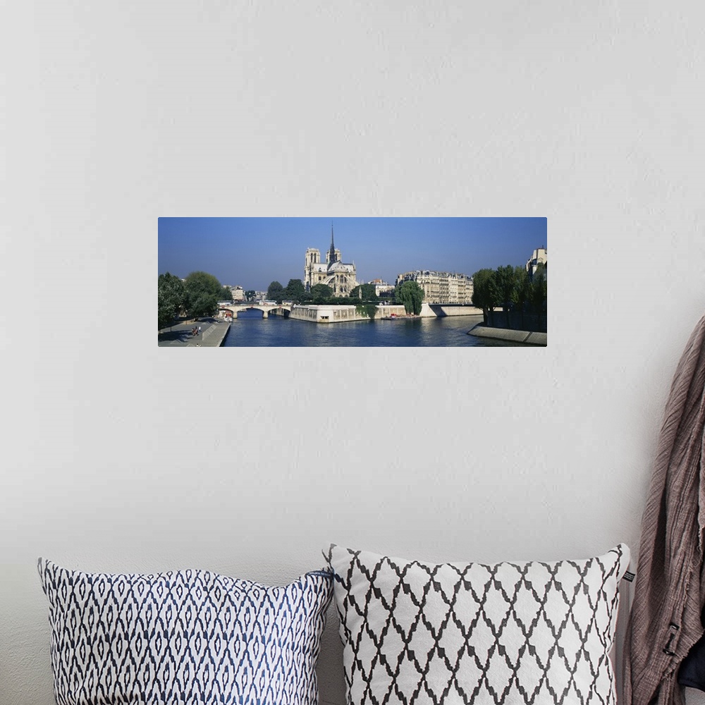 A bohemian room featuring Cathedral along a river, Notre Dame Cathedral, Seine River, Paris, France