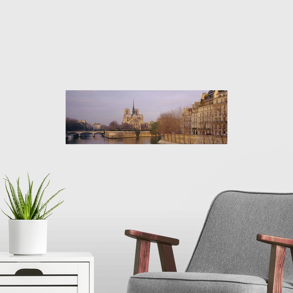 A modern room featuring Cathedral near Seine river, Notre Dame Cathedral, Paris, France