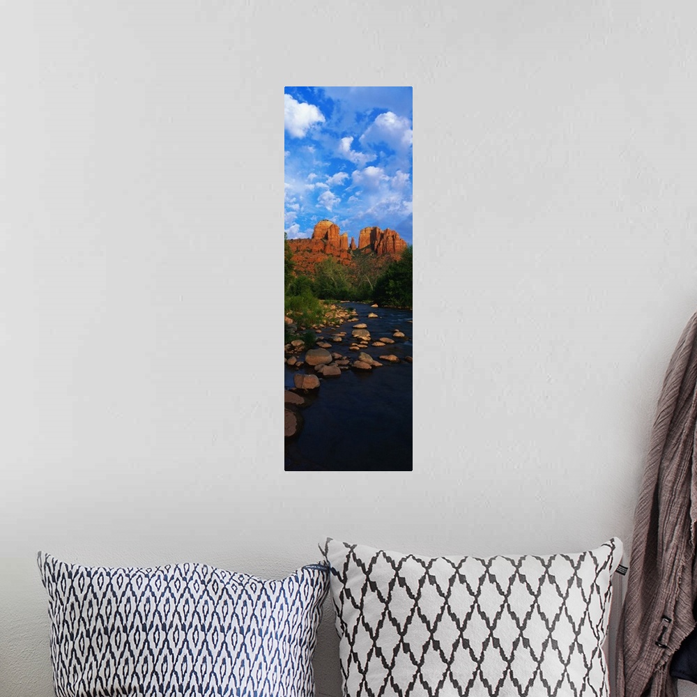 A bohemian room featuring Giant, vertical photograph of a rocky river in Oak Creek Red Rock Crossing, in Arizona, leading t...