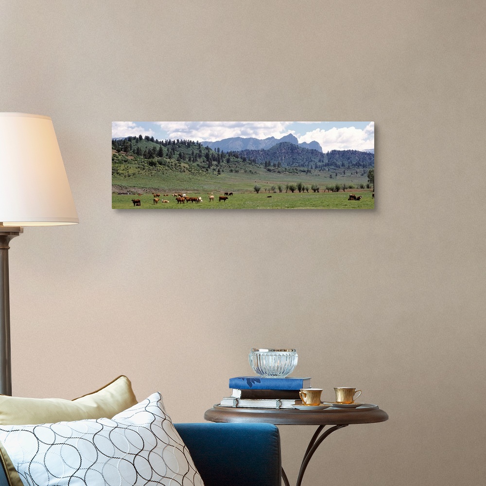 A traditional room featuring Cattle Grazing US 84 At Chromo Colorado