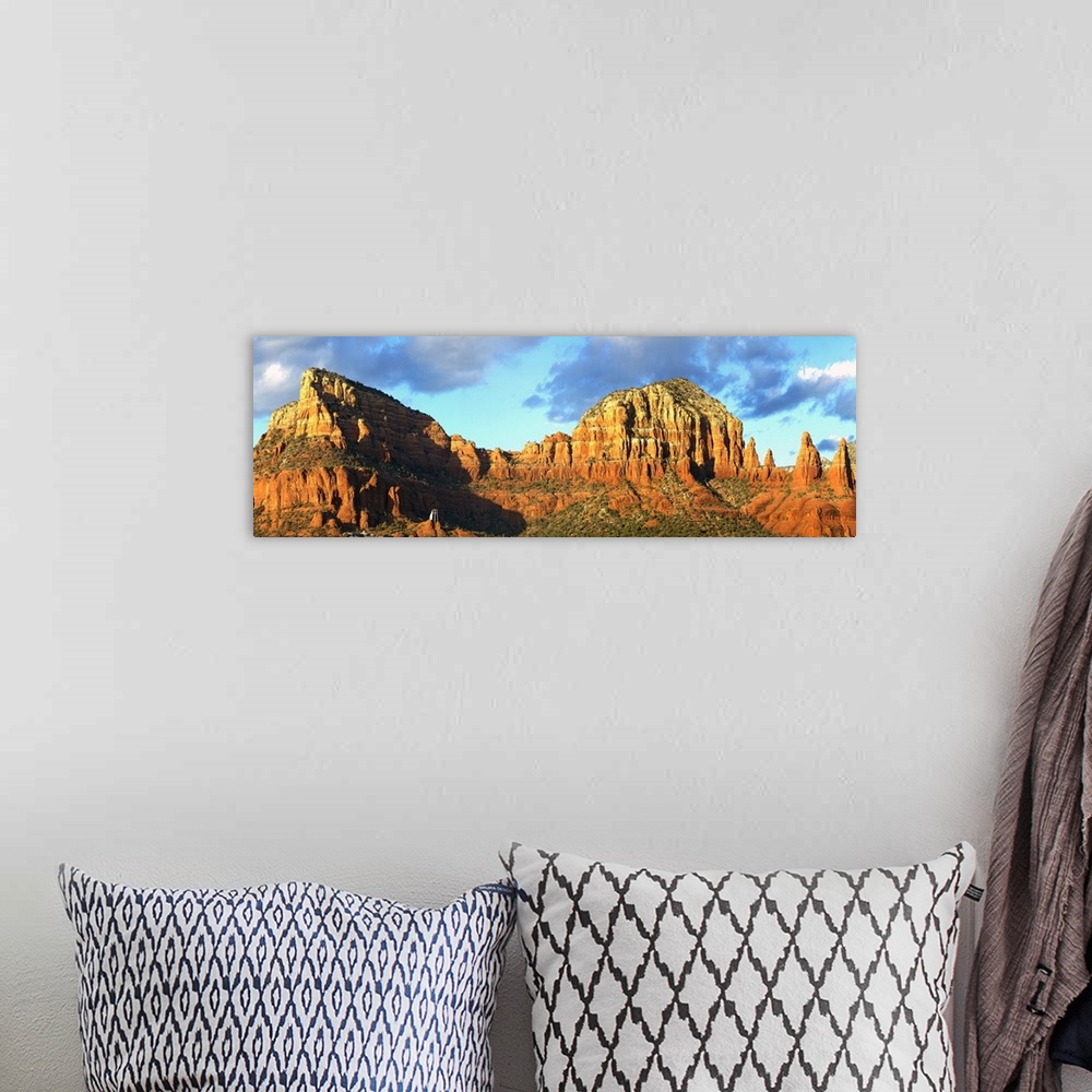 A bohemian room featuring Long image of rock formations and canyons in Arizona printed on canvas.