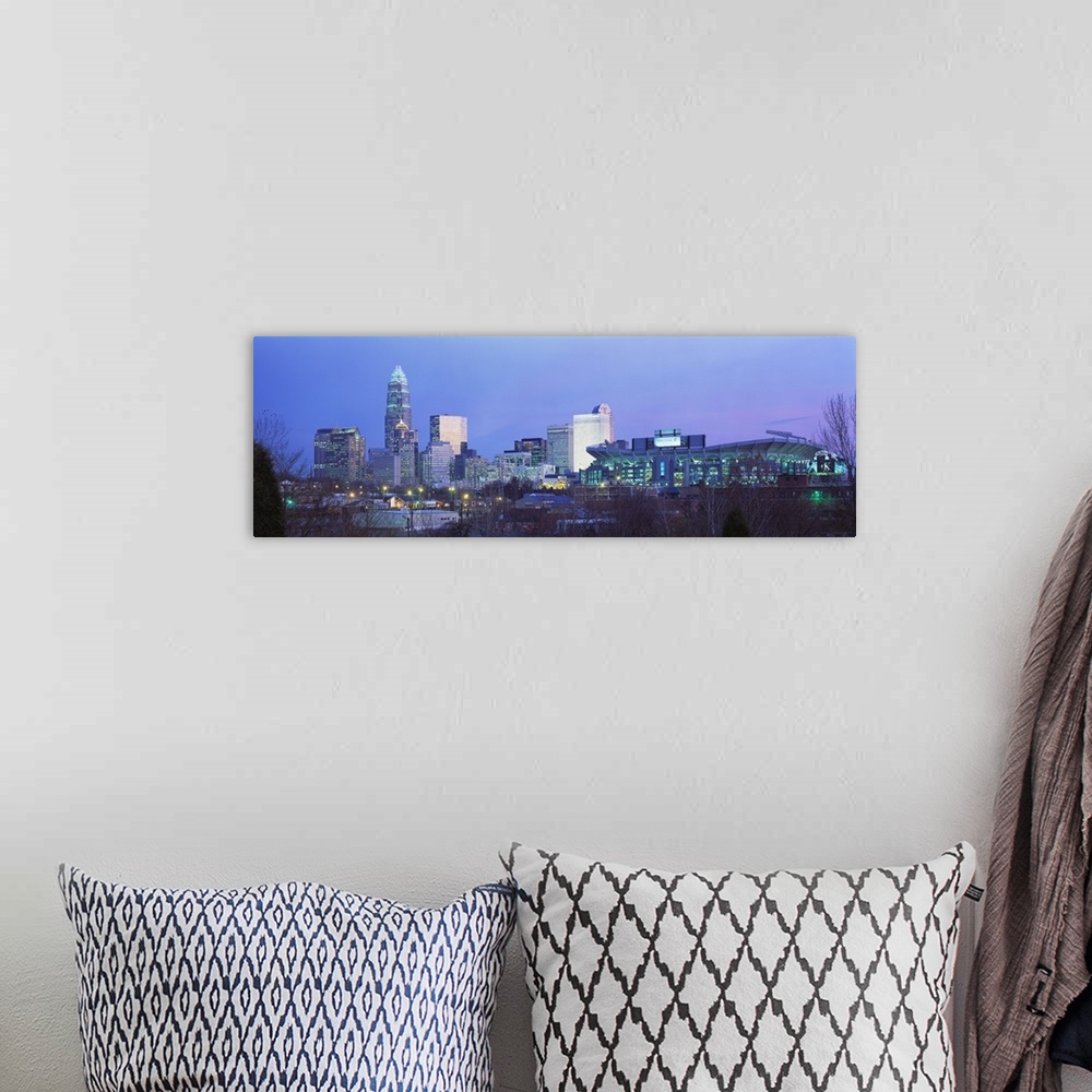 A bohemian room featuring Downtown skyline of Charlotte, North Carolina, featuring the Ericsson Stadium. This photograph wa...