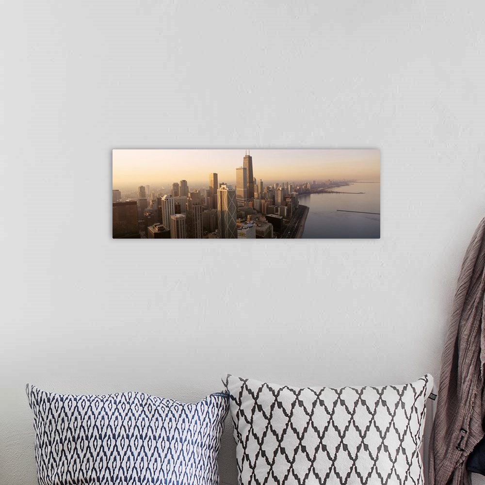 A bohemian room featuring High angle panoramic photograph taken of the skyscrapers in Chicago during sunrise with the lake ...
