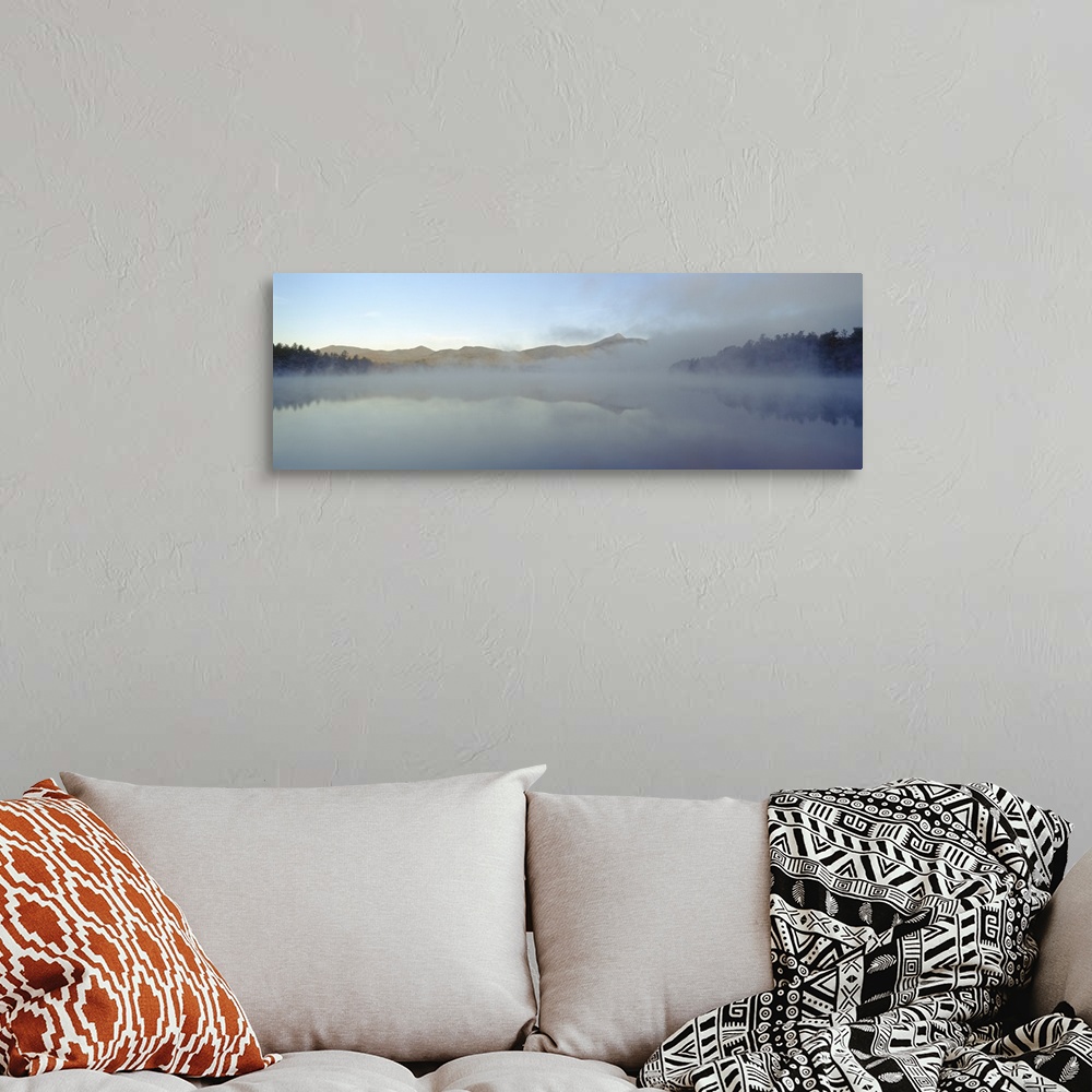 A bohemian room featuring Wall art for the home or office this panoramic photograph shows mist rising off a New England lake.