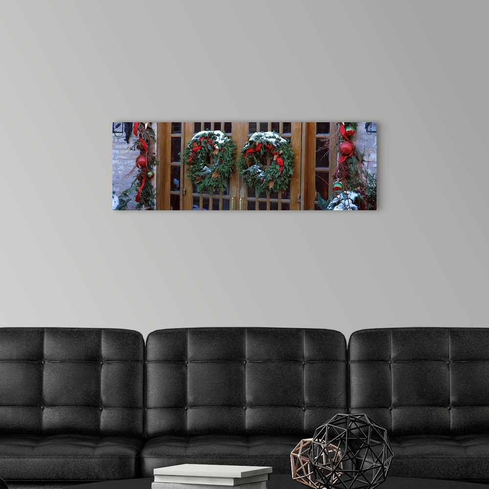 A modern room featuring Christmas wreaths hanging on doors, Grand Rapids, Kent County, Michigan,