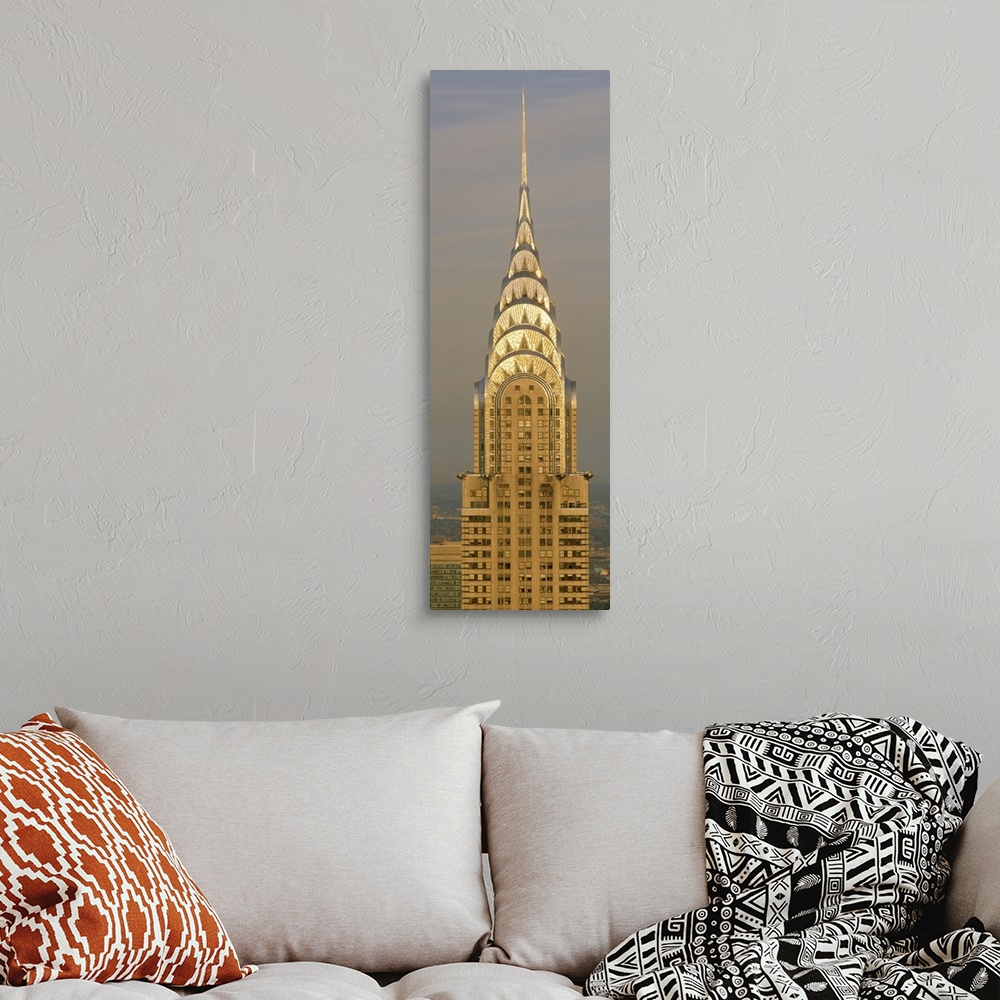 A bohemian room featuring Closeup photograph of the top of the Chrysler Building shining in the sun in New York City, NY (N...