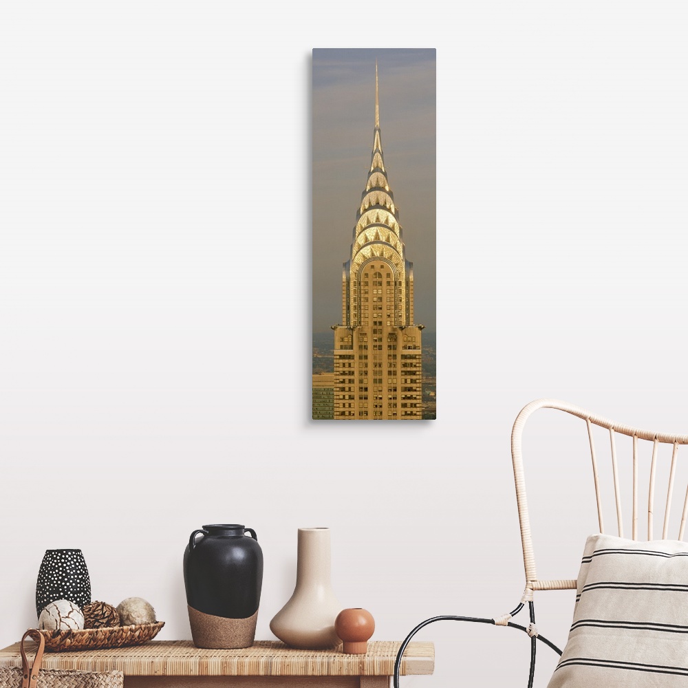 A farmhouse room featuring Closeup photograph of the top of the Chrysler Building shining in the sun in New York City, NY (N...