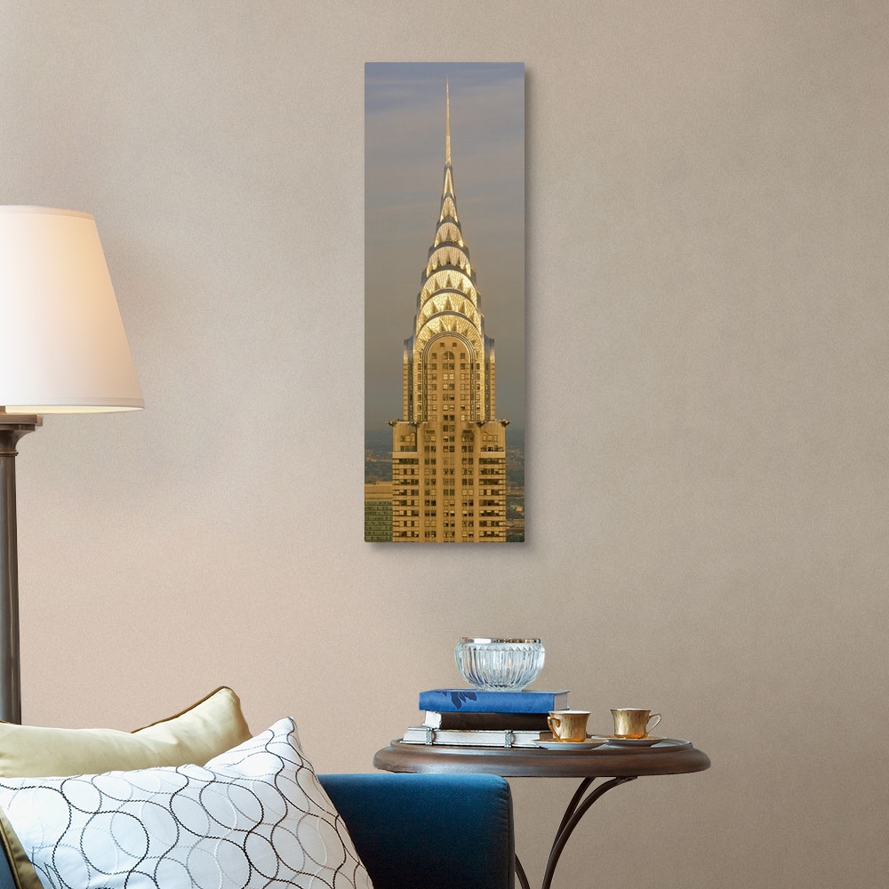 A traditional room featuring Closeup photograph of the top of the Chrysler Building shining in the sun in New York City, NY (N...