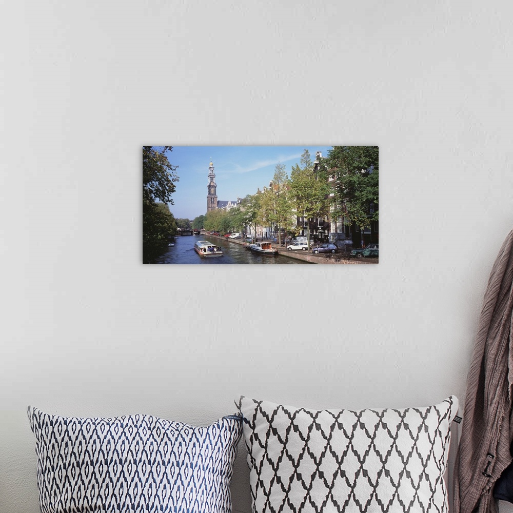 A bohemian room featuring Church along a channel in Amsterdam Netherlands