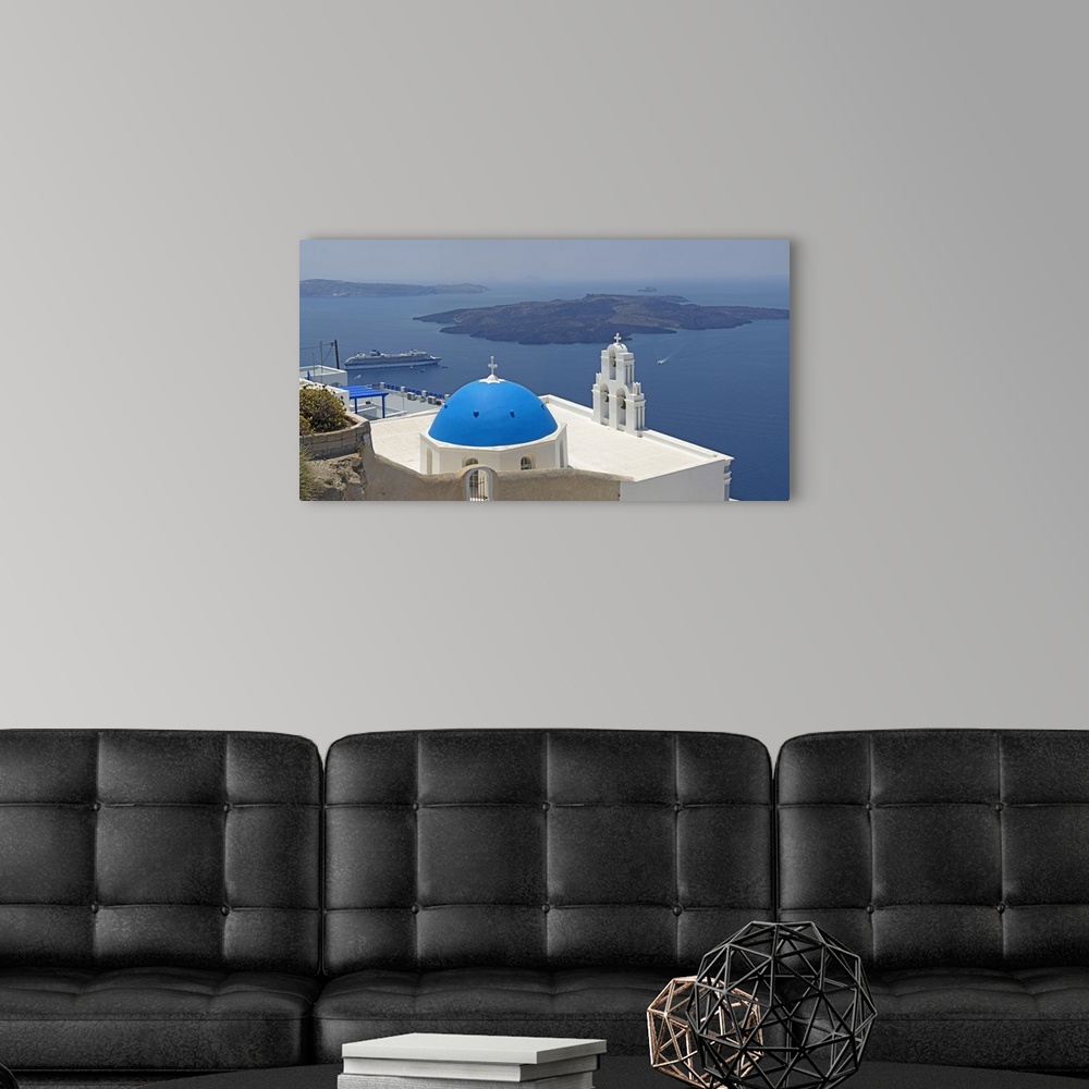 A modern room featuring Church overlooking a sea, Aegean Sea, Santorini, Cyclades Islands, Greece