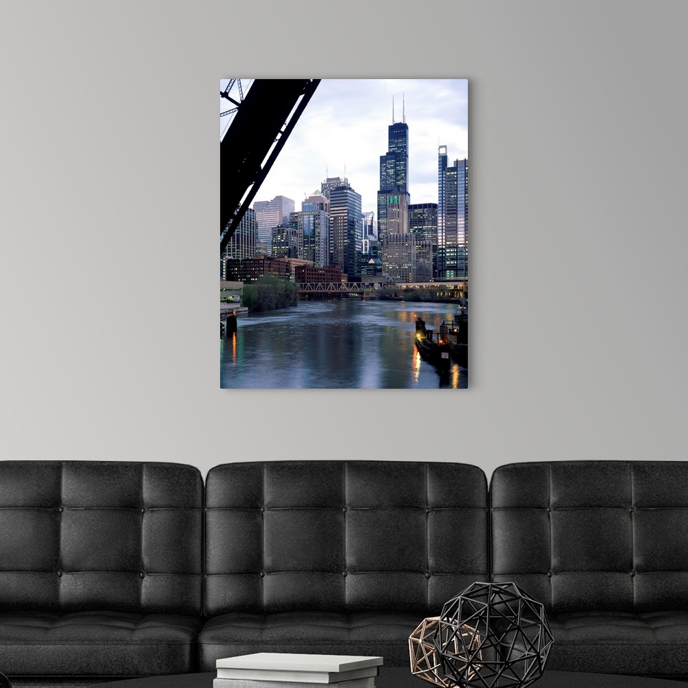 A modern room featuring Viewed through an iron work strut this vertical landscape photograph shows the Windy City at the ...
