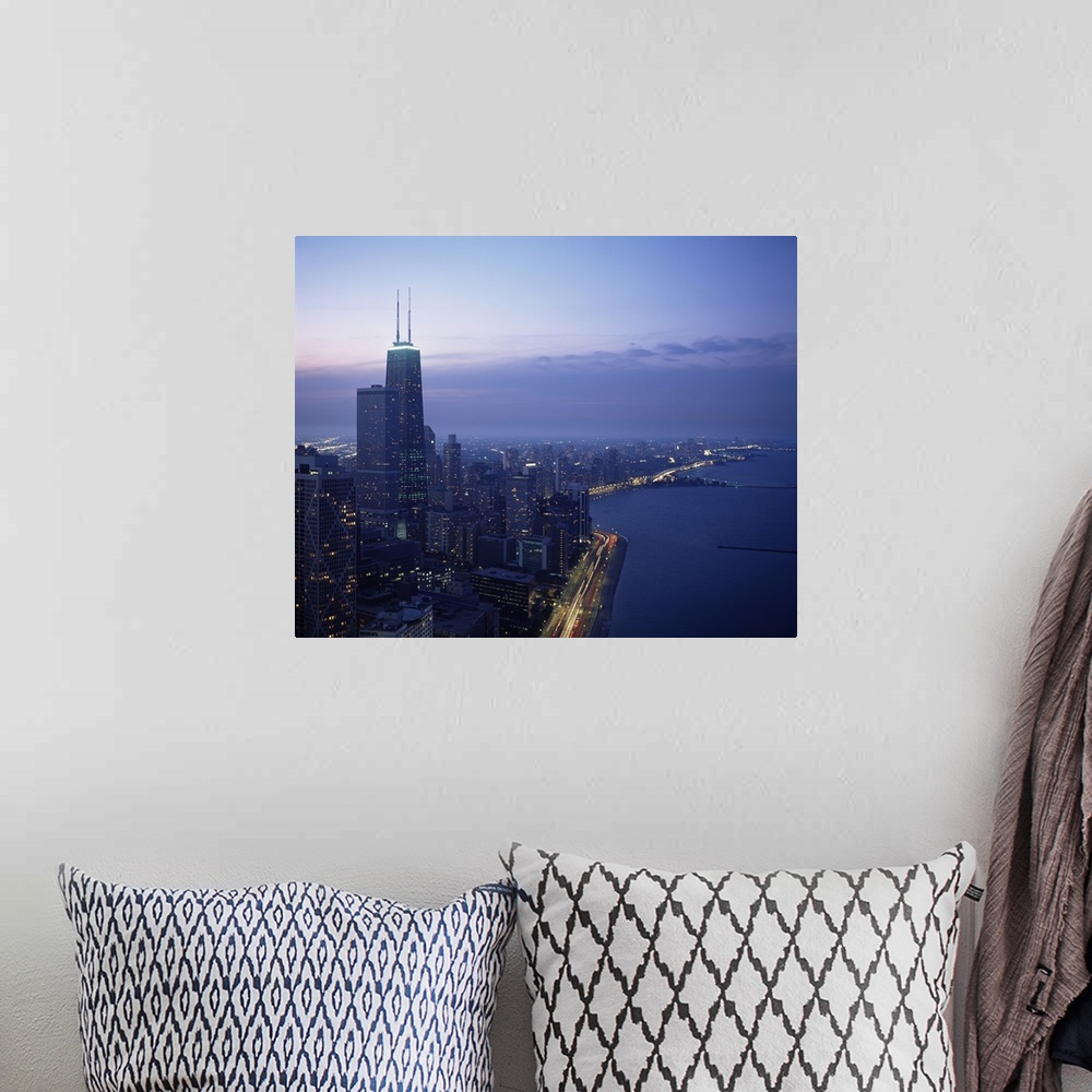 A bohemian room featuring This large piece is a photograph taken of Chicago during dusk showing the busy city to the left a...