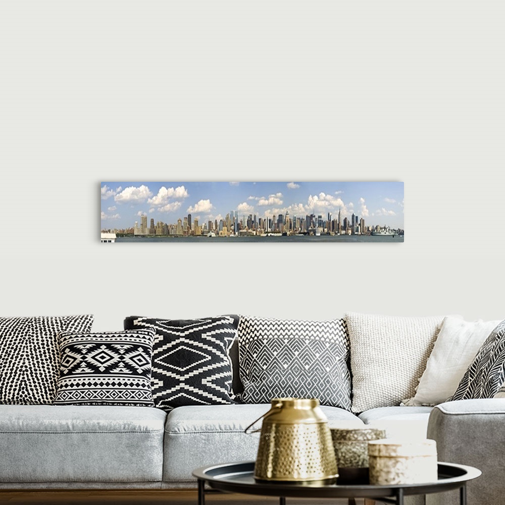 A bohemian room featuring Panoramic of the New York City Skyline on a bright sunny day.