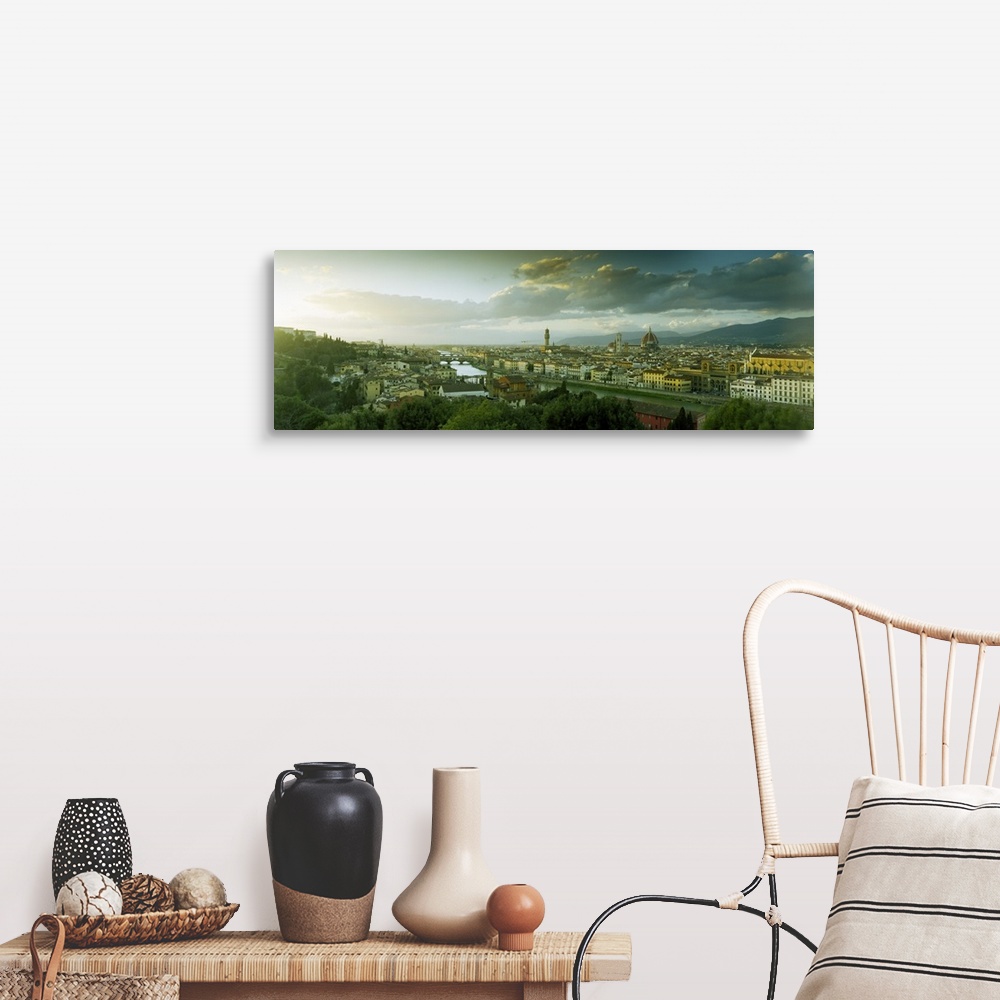 A farmhouse room featuring Panoramic photograph taken from an aerial view overlooking a busy city within Europe.  In the dis...