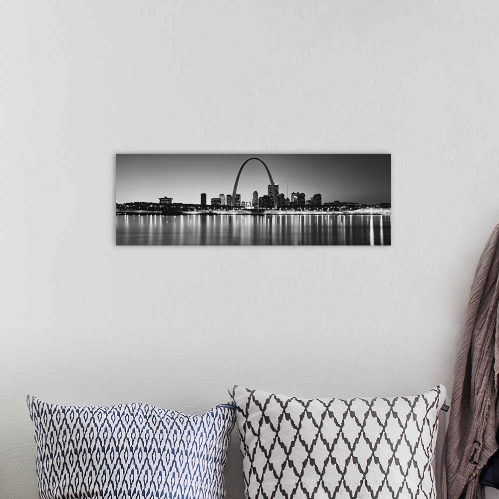 A bohemian room featuring Panoramic photo on canvas of the St. Louis skyline at night.