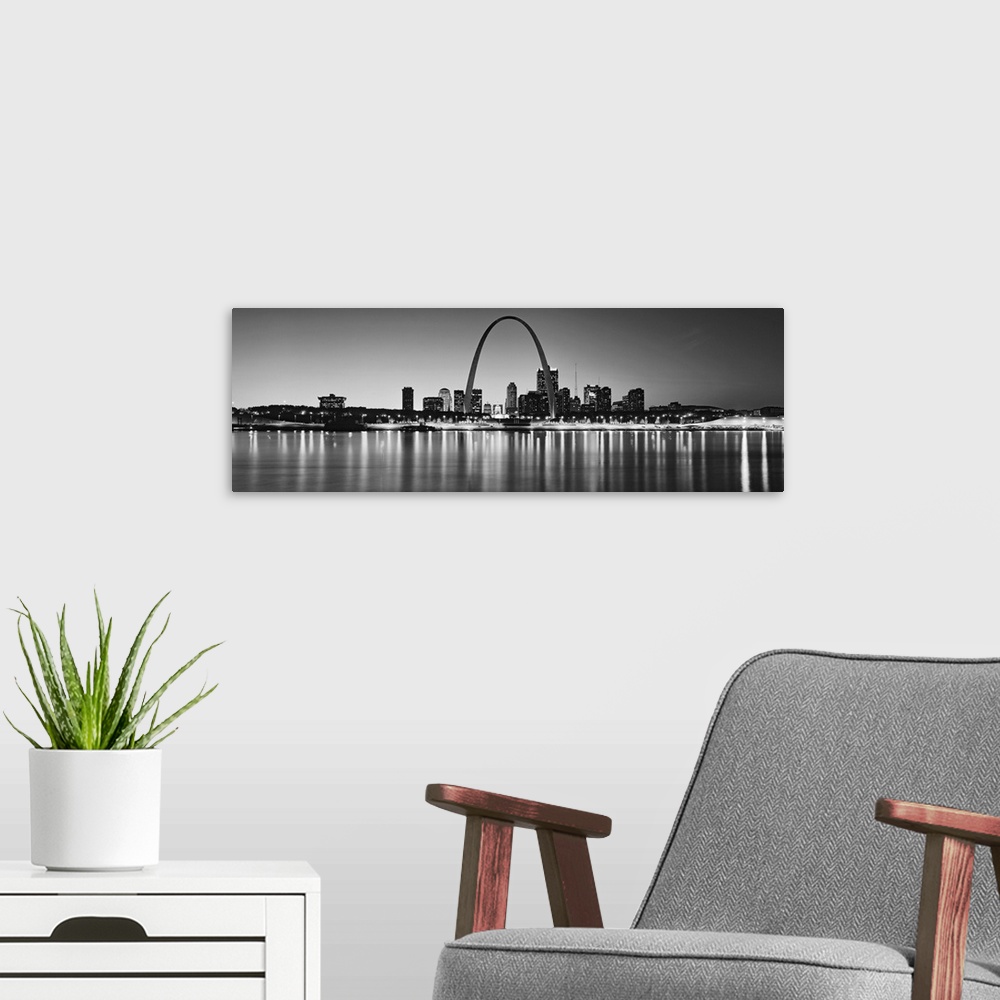 A modern room featuring Panoramic photo on canvas of the St. Louis skyline at night.