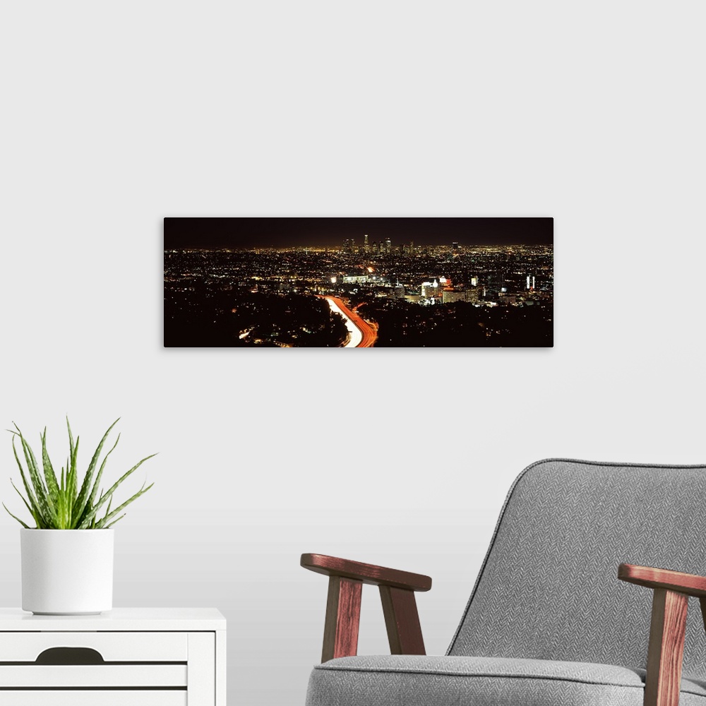 A modern room featuring City lit up at night, Hollywood, City Of Los Angeles, Los Angeles County, California, USA