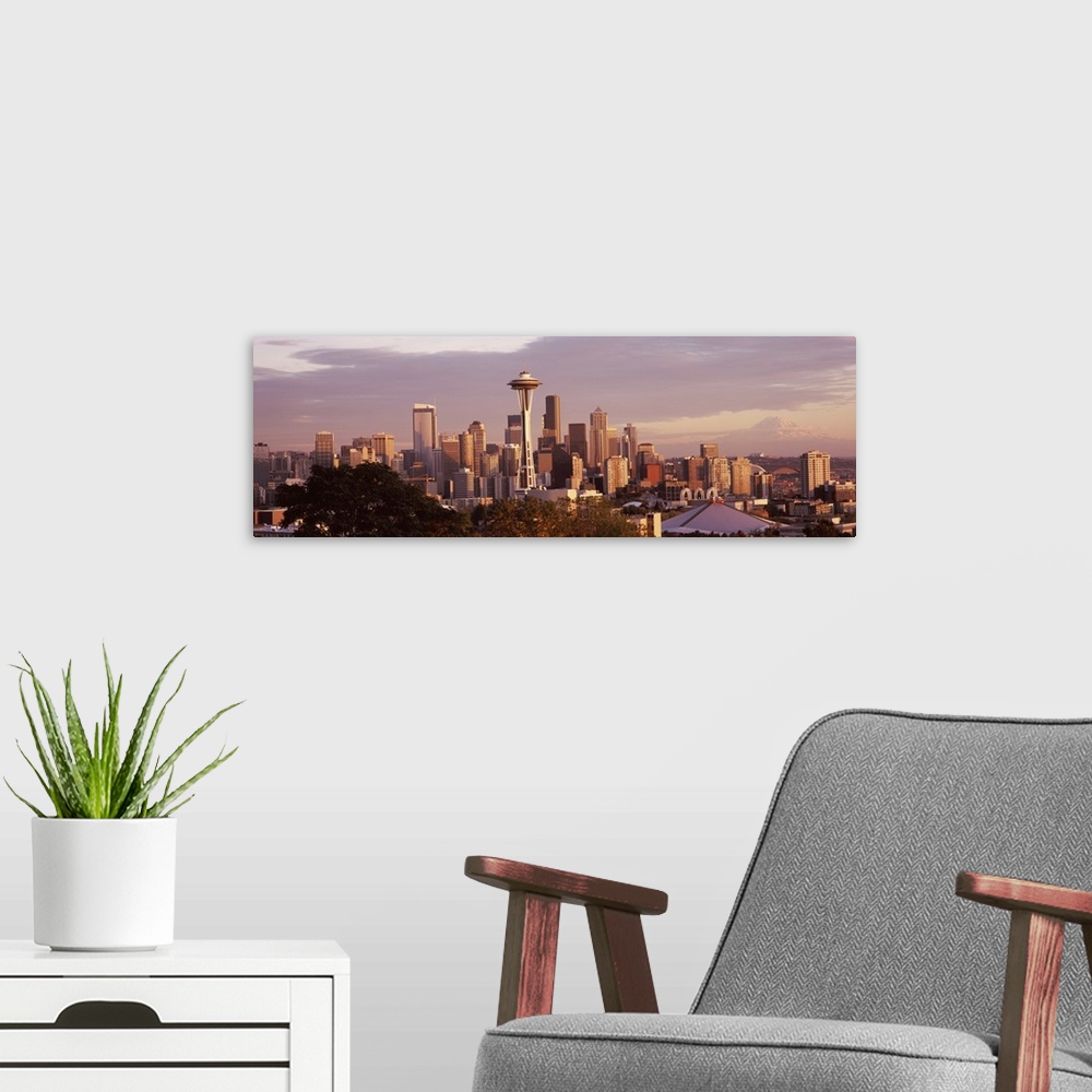 A modern room featuring Big horizontal photograph the Seattle skyline, including the Space Needle, taken from Queen Anne ...