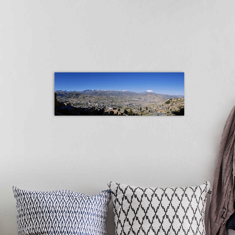 A bohemian room featuring City with mountains in the background, Mt Illimani, La Paz, Bolivia