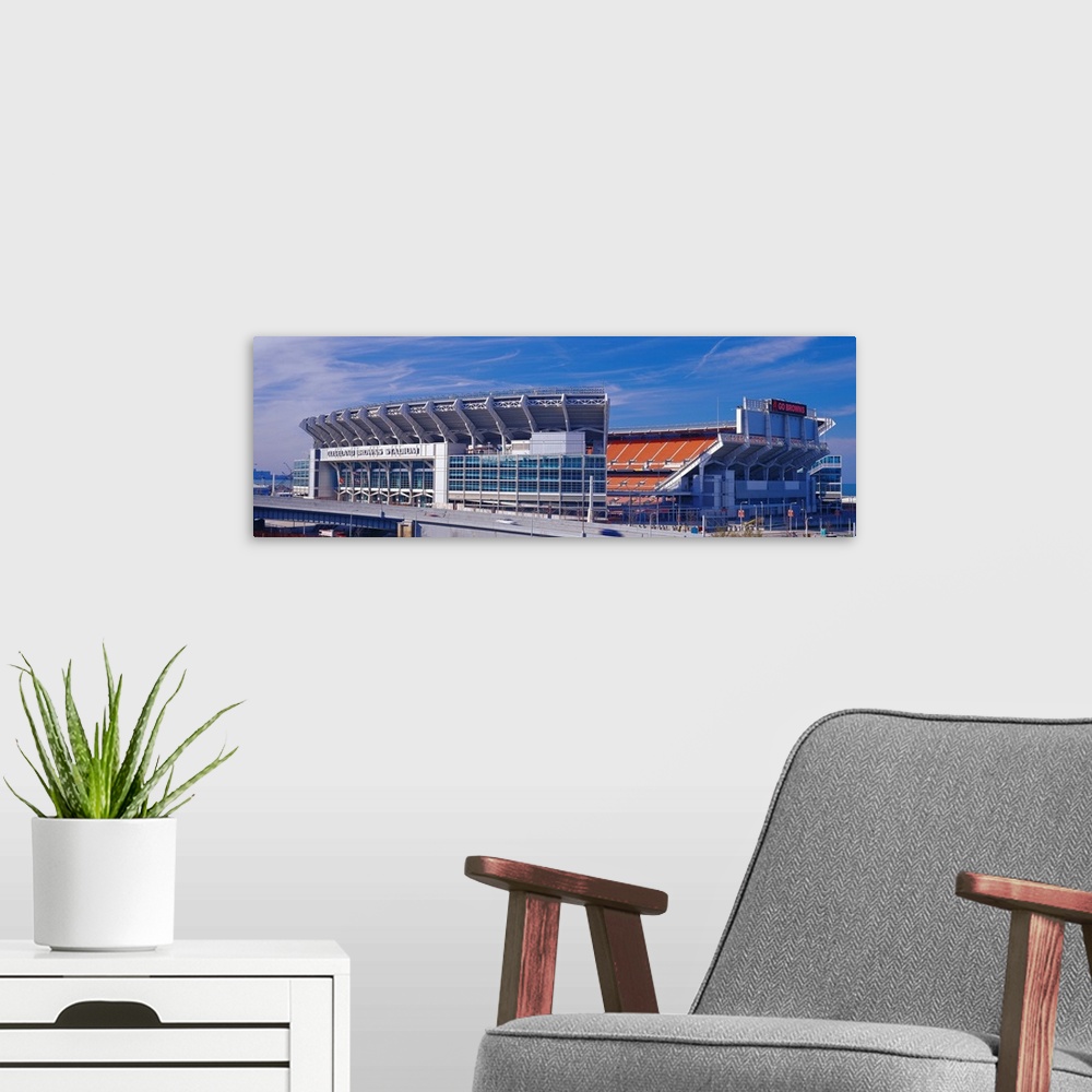 A modern room featuring Panoramic photograph on a sunny day displays FirstEnergy Stadium from the National Football Leagu...
