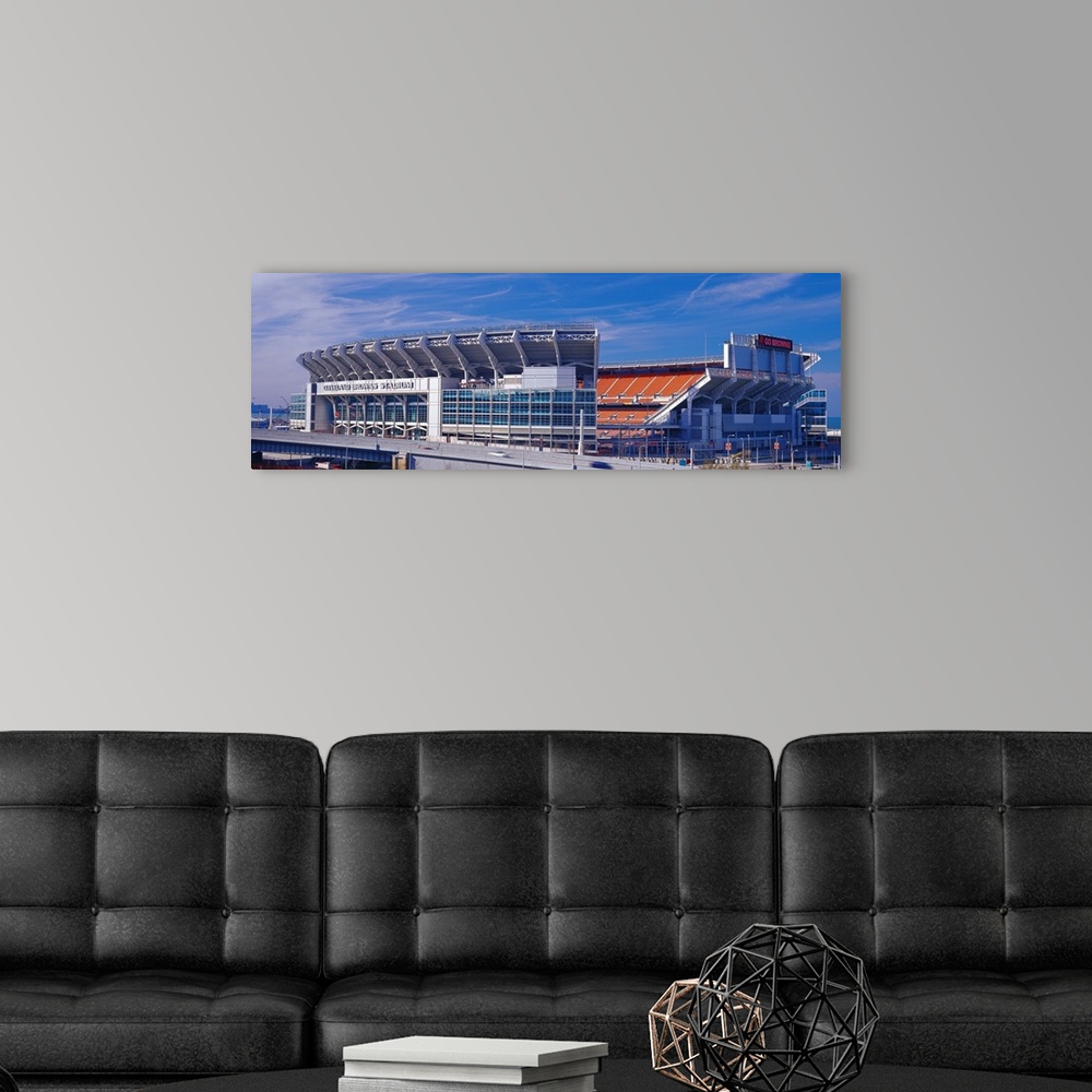 A modern room featuring Panoramic photograph on a sunny day displays FirstEnergy Stadium from the National Football Leagu...