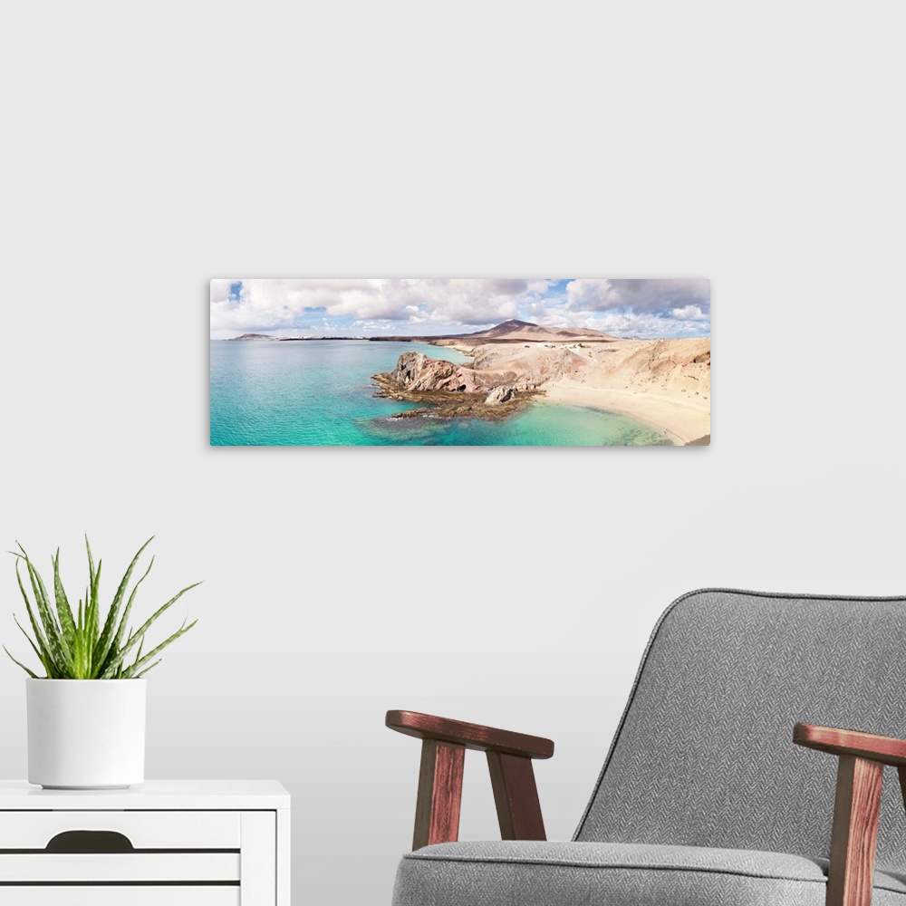 A modern room featuring Cliffs on the beach, Papagayo Beach, Lanzarote, Canary Islands, Spain